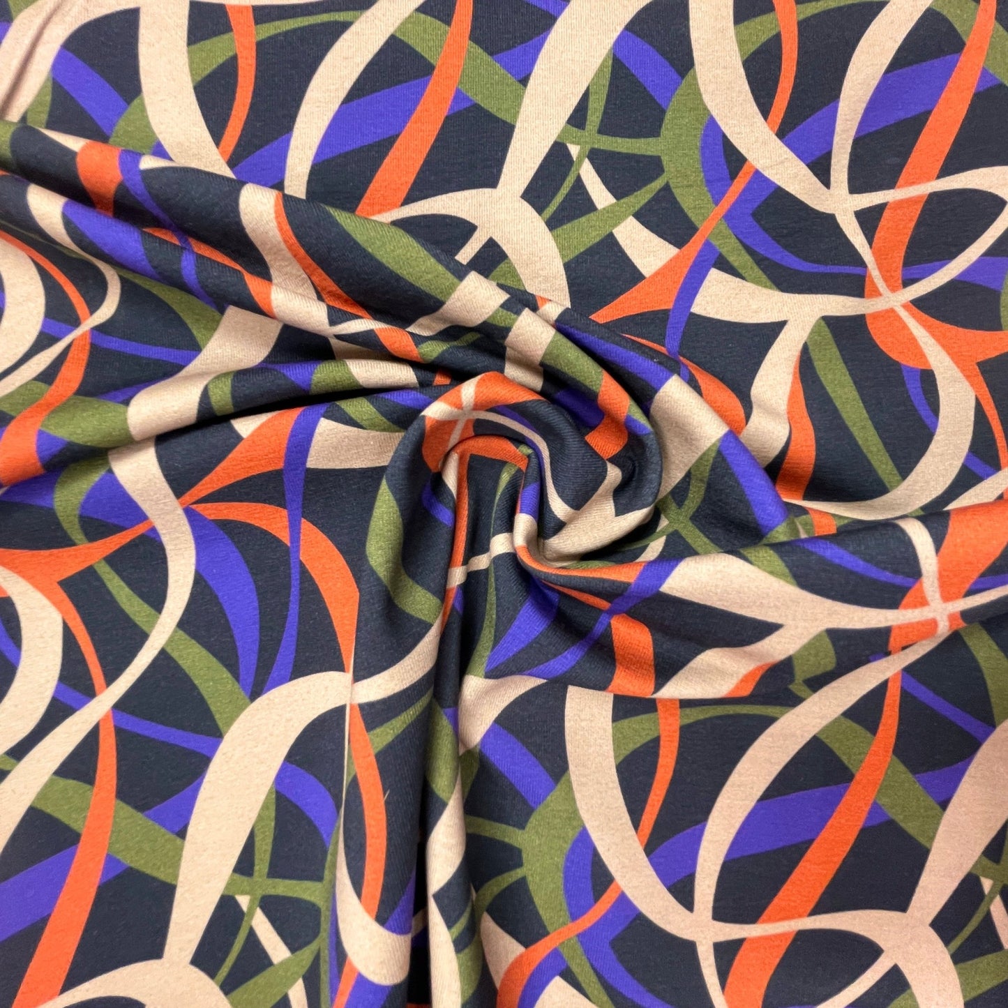 Jersey en coton à motif beige, lilas, orange et vert, 250 g/m²