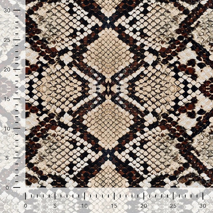 Image avec tissu en maille bouclette de coton effet peau de serpent – disponible en ligne chez Šarlotes audumi