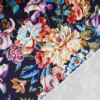 Maille bouclette en coton - fleurs sur fond bleu foncé 260 g/m²