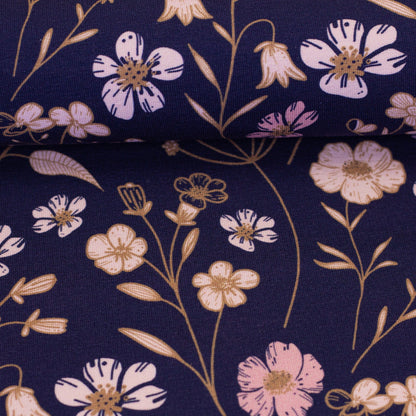 Maille bouclée en coton à motif floral sur fond bleu foncé 265 g/m²