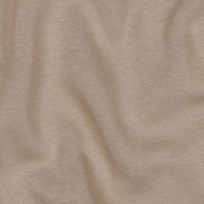 Jersey matelassé en coton beige 285 g/m², disponible chez Šarlotes audumi