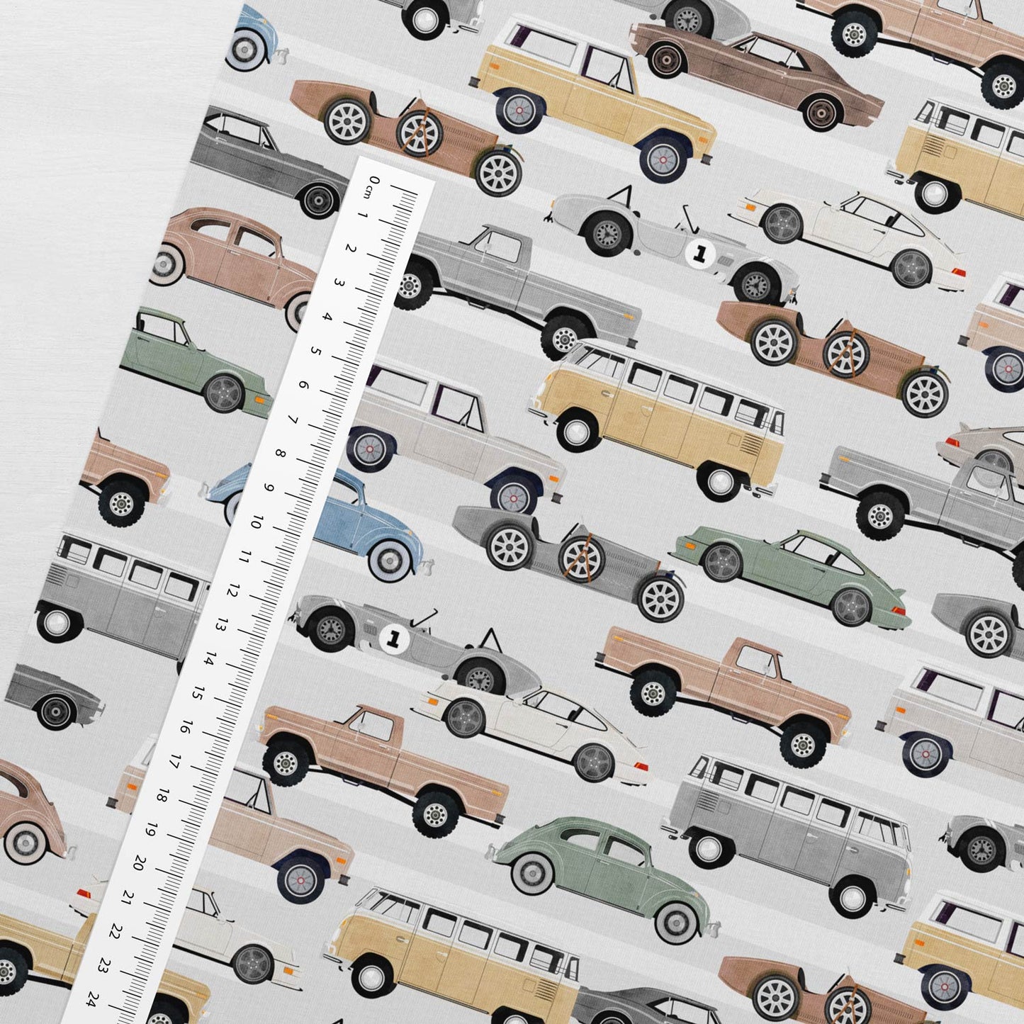 Image with cotton knit - car in light gray tones 200 g/m² – available at Šarlotes audumi