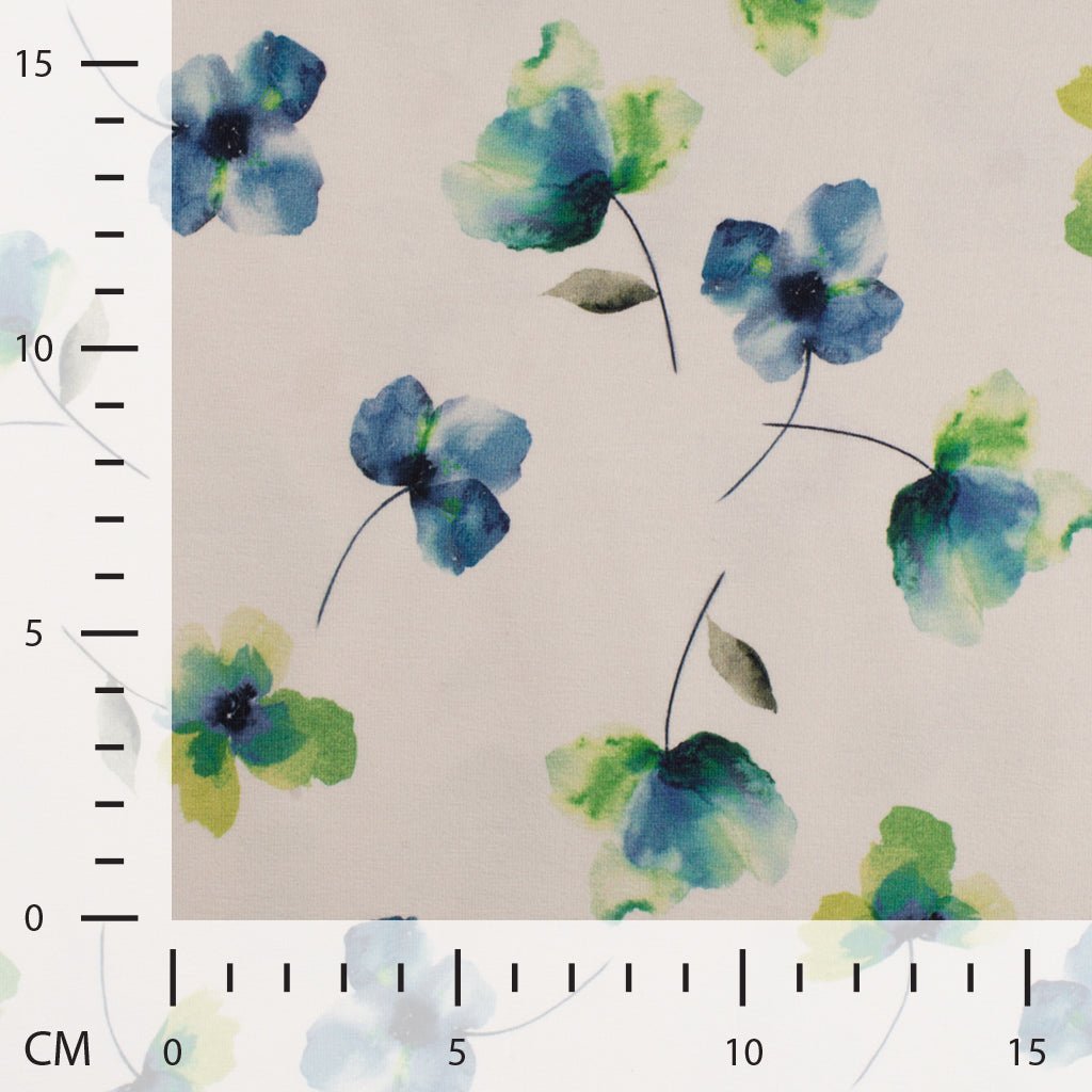 Image of cotton jersey knit with sky-blue flowers – available online at Charlotte's Fabrics