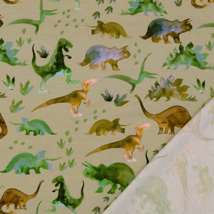 Image de tissu en tricot de coton avec dinosaures – disponible en ligne chez Šarlotes audumi