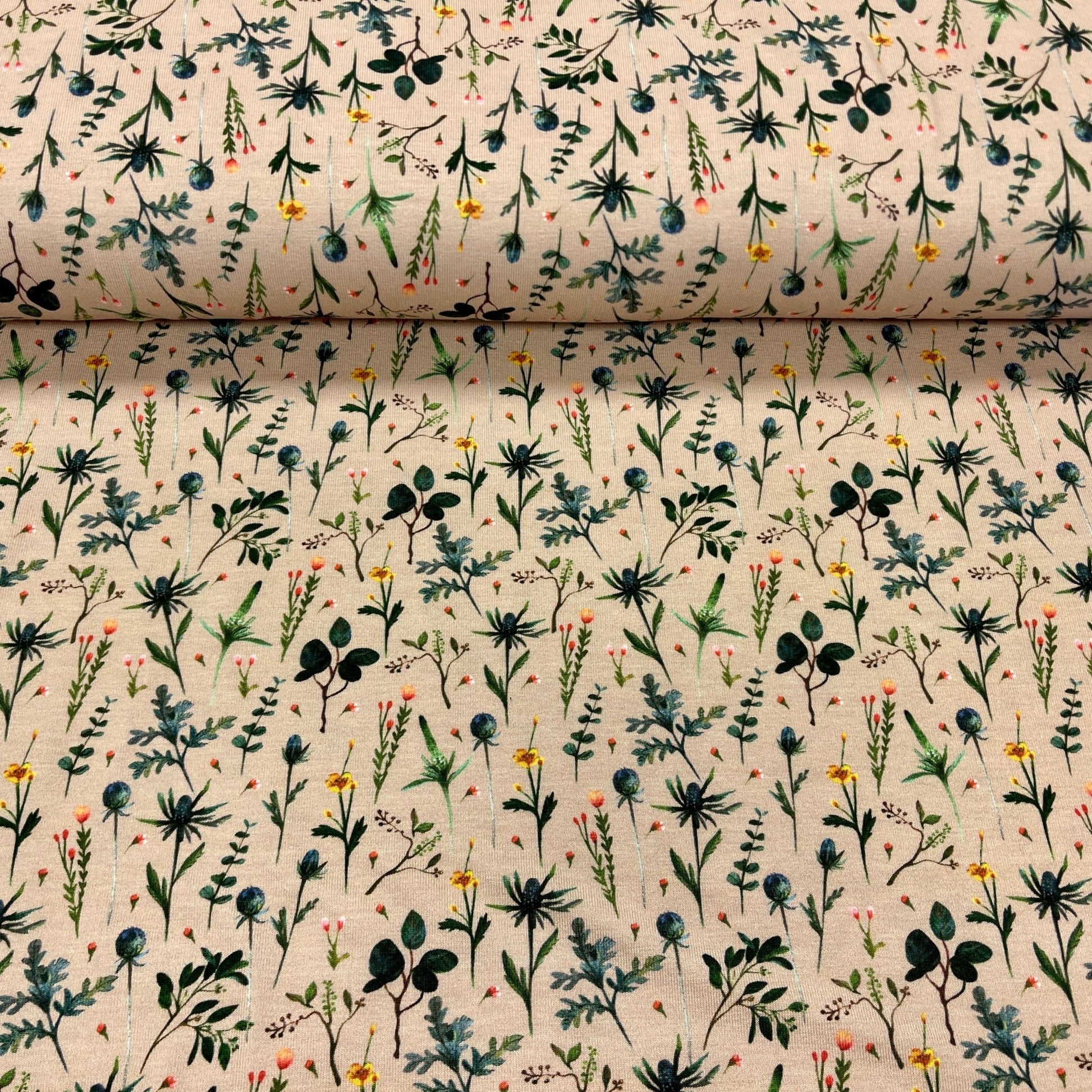 Jersey de coton motif prairie sur fond beige 210 g/m²