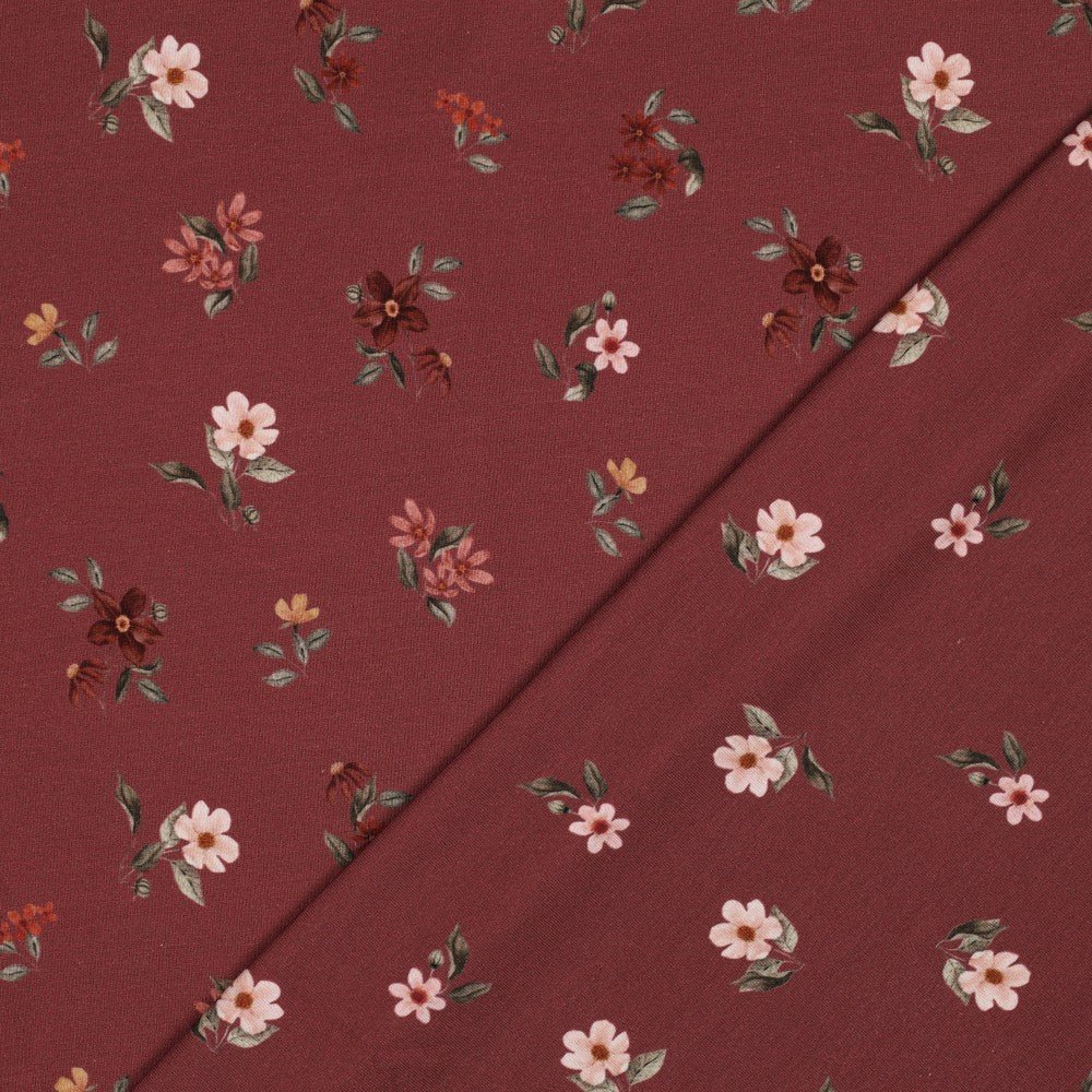 Jersey en coton - fleurs sur fond bordeaux 200 g/m²