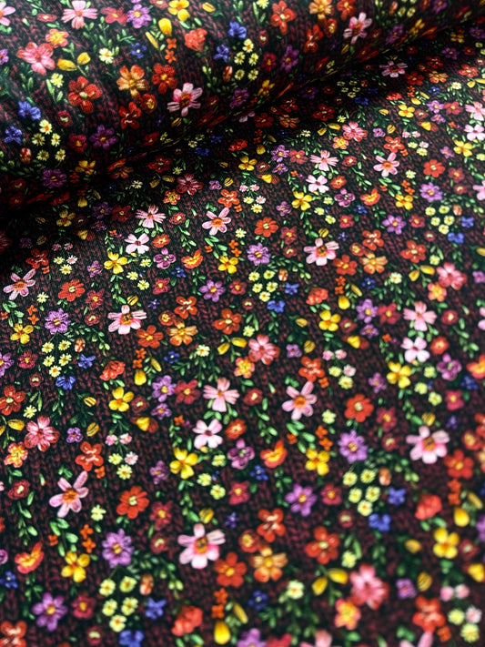 Cotton jersey - tiny flowers with a knit pattern in the background 200 g/m²