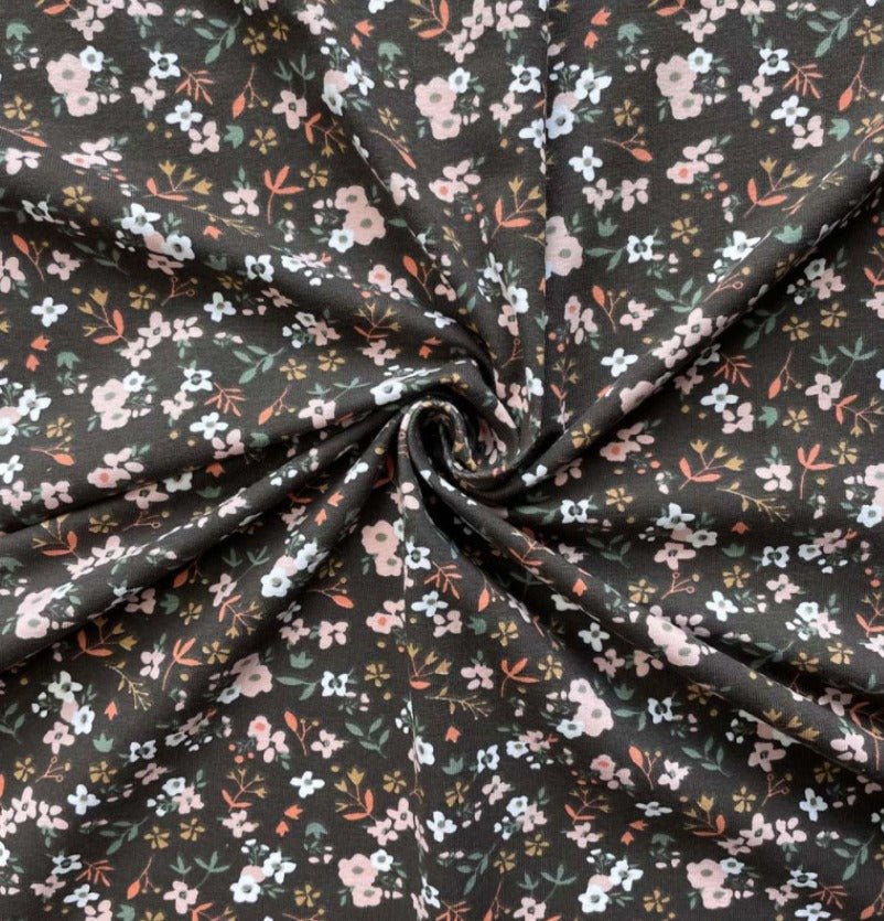 alt
Image with cotton jersey - delicate little flowers on dark brown 200 g/m² – available at Šarlotes audumi