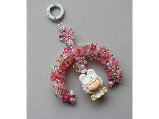 Image avec pendentif en métal – nœud 13×20 mm, 5 pièces | tons variés – disponible chez Šarlotes audumi