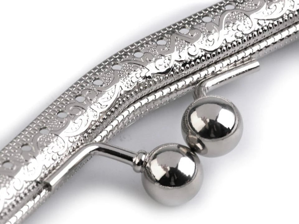 Image of a metal purse frame for sewing with handle, 5 × 8 cm | assorted shades – available at Charlotte's Fabrics