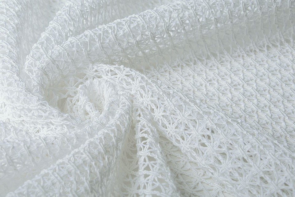 Mežģīņu audums - balts 345 g/m²