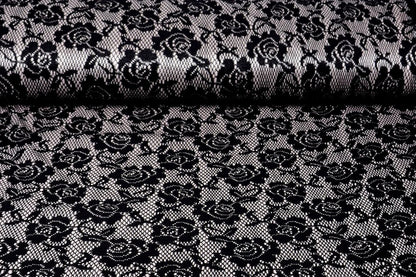 Image de tissu en dentelle noir avec doublure en satin blanc 155 g/m² – disponible chez Šarlotes audumi