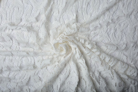 Tissu en dentelle - velours blanc laiteux 200 g/m²