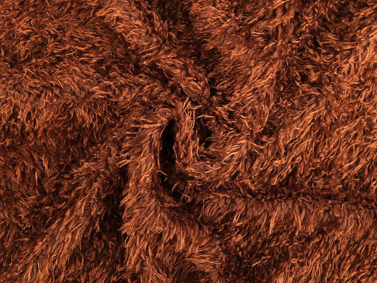 Tissu pelucheux doux effet fourrure brun orangé - conditionnement 1 m - disponible en ligne chez Šarlotes audumi