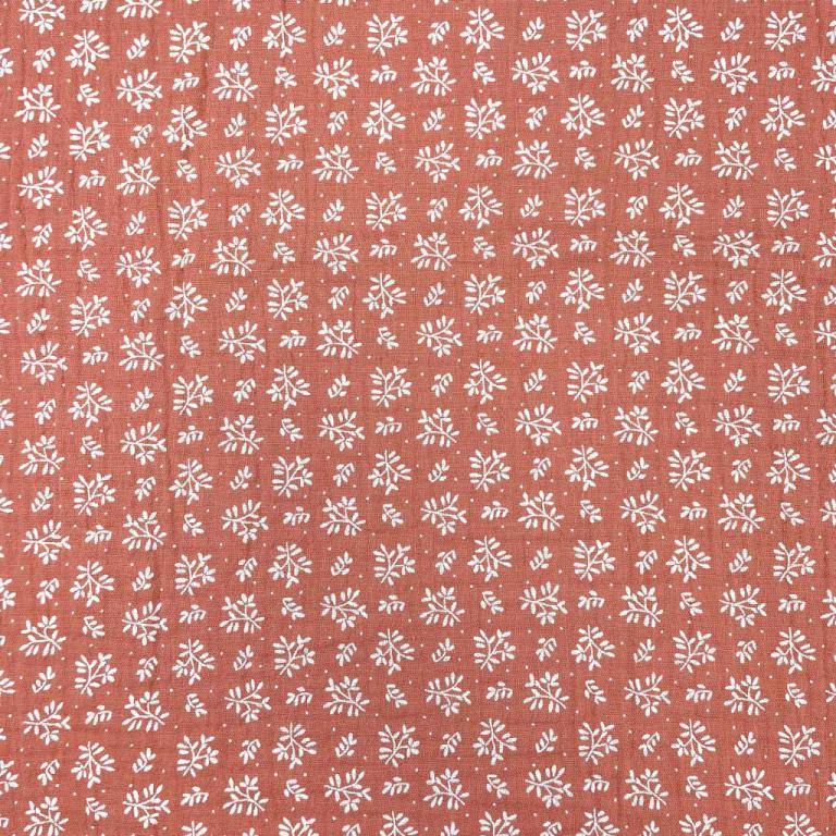 muslin - white flowers on an orange background 130 g/m²