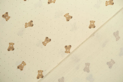 Mousseline - petits ours sur fond jaune beurre 125 g/m²