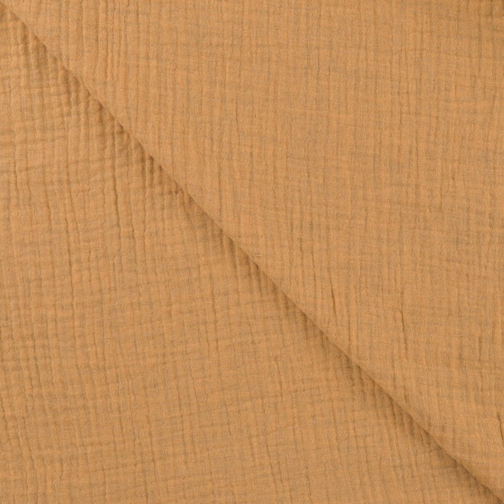 Image de Muslin caramel au lait – disponible en ligne chez Šarlotes audumi