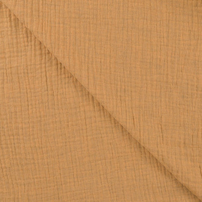 Image de Muslin caramel au lait – disponible en ligne chez Šarlotes audumi