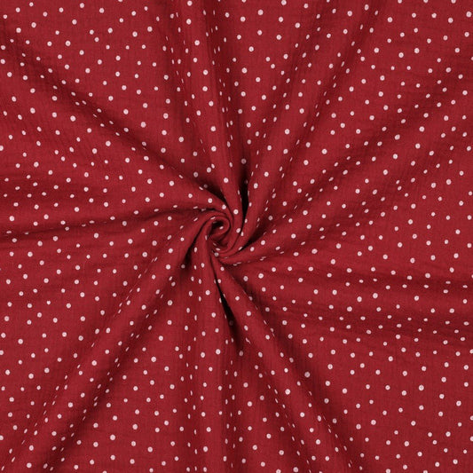 txt
Image de mousseline à pois sur fond rouge foncé 125 g/m² – disponible chez Šarlotes audumi