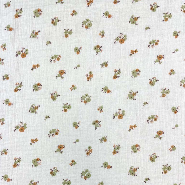 Muslin - fleurs sur fond orange 130 g/m²