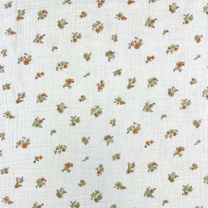 Muslin - fleurs sur fond orange 130 g/m²
