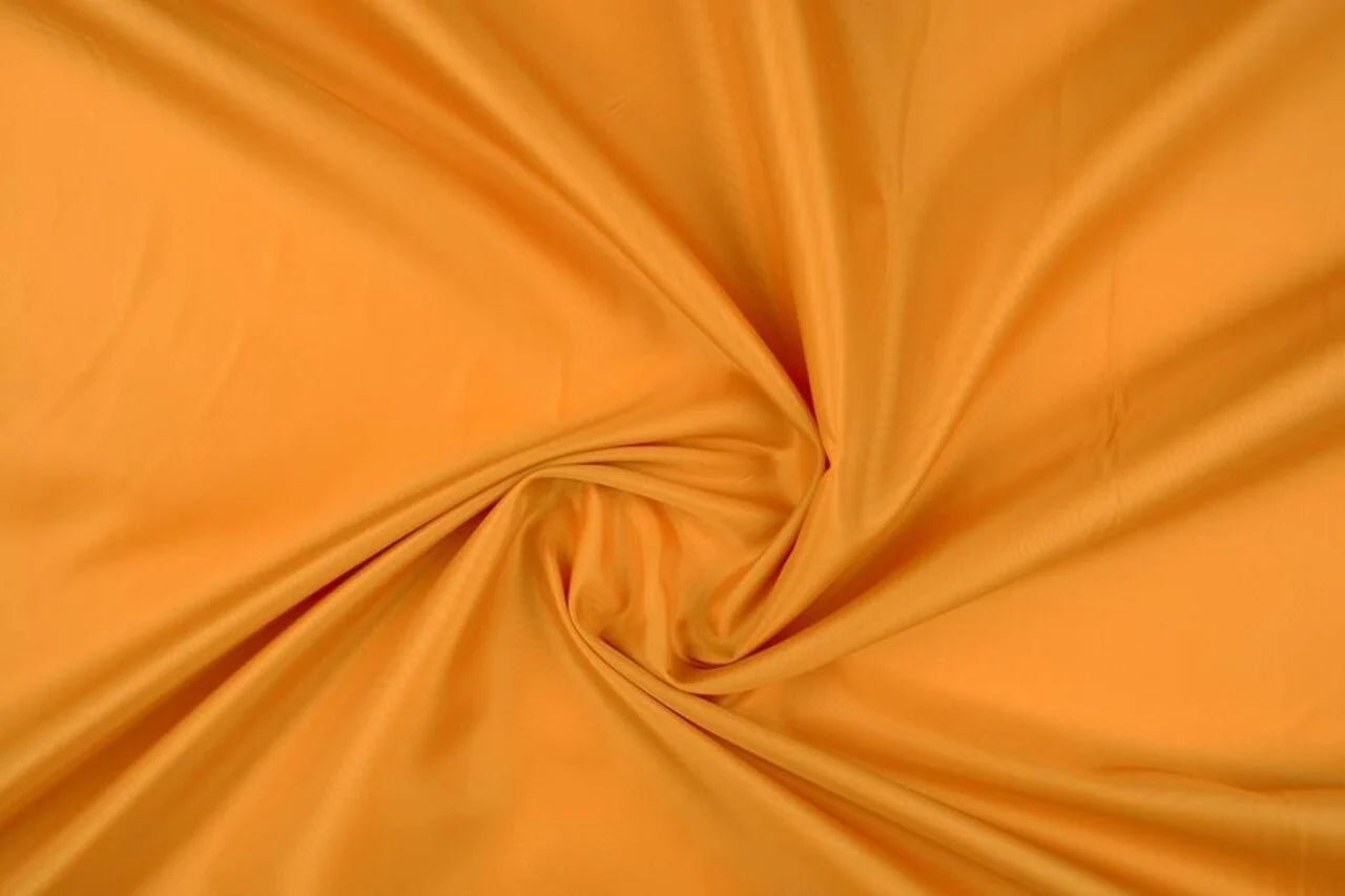 Image de tissu de doublure - jaune foncé 55 g/m² – disponible chez Šarlotes audumi