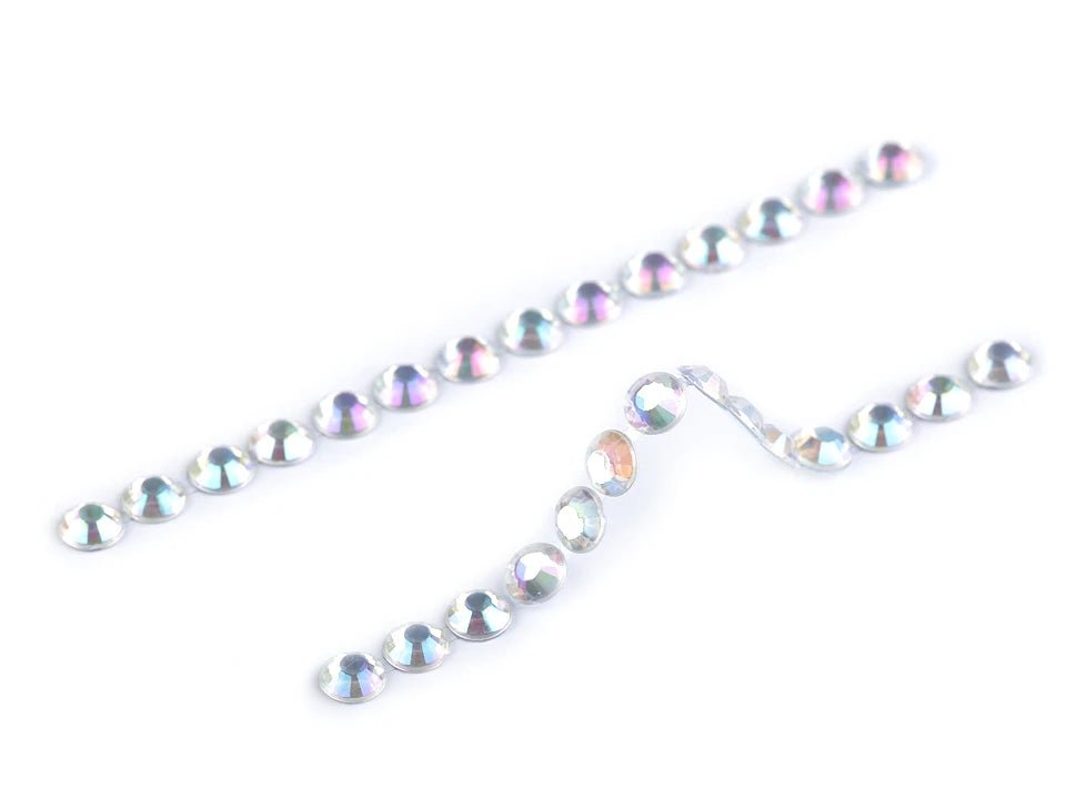 Image with self-adhesive crystal stones Ø6 mm – available online at Šarlotes audumi