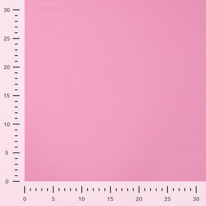 Image d’un tissu de maillot de bain avec UPF 50+ et résistance au chlore - rose – disponible en ligne chez les tissus de Charlotte