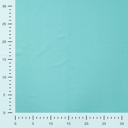 Image d’un tissu de maillot de bain turquoise avec UPF 50+ et résistance au chlore – disponible en ligne Šarlotes audumi