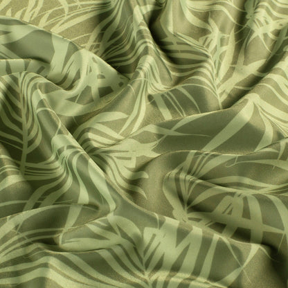 Image d’un tissu pour maillot de bain en lycra avec protection UPF50 – feuilles vert olive 200 g/m² – disponible chez Šarlotes audumi