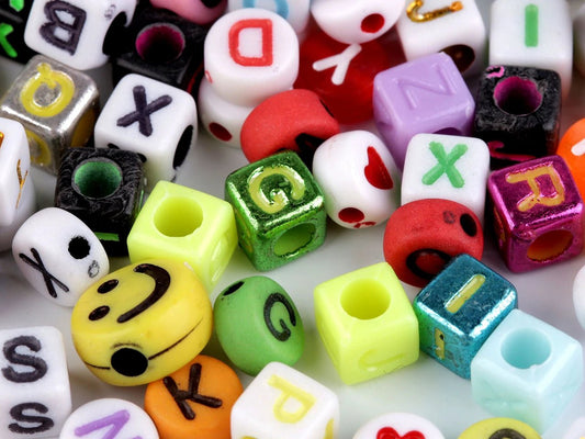 Image with a plastic bead mix – letters, hearts and smiley faces | 6–10 mm – available at Šarlotes audumi