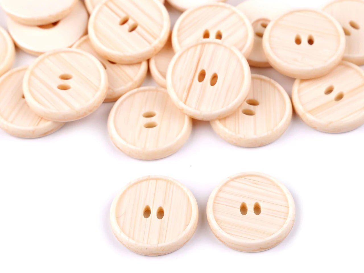 Boutons en plastique 20 mm - beiges