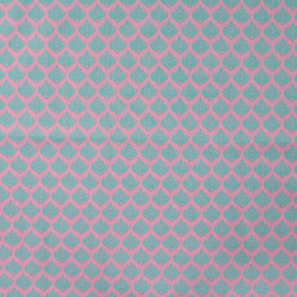 Image du tissu premium 100 % coton - feuilles turquoise – disponible en ligne chez Tissus Charlotte