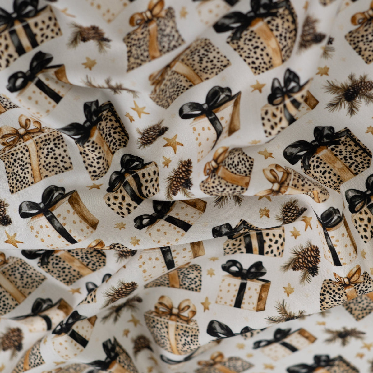 Image avec tissu 100 % coton premium – cadeaux léopard de Noël, disponible en ligne chez Tissus Charlotte