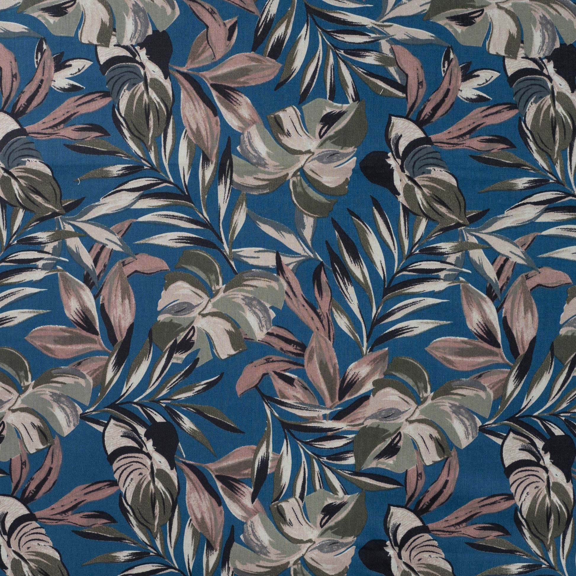 Premium cotton poplin fabric with tropical foliage on blue – available online at Charlotte's Fabrics
