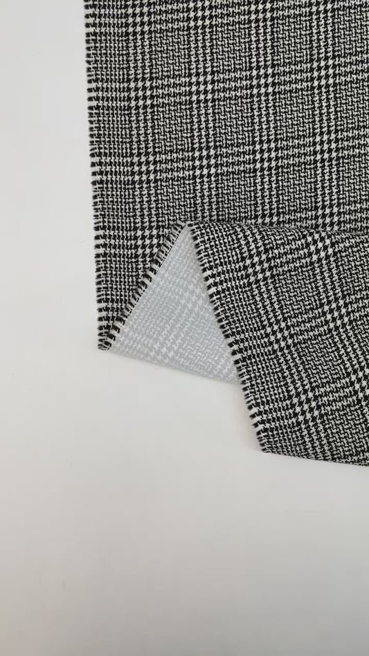 Tissu tweed en laine noir et blanc 480 g/m²