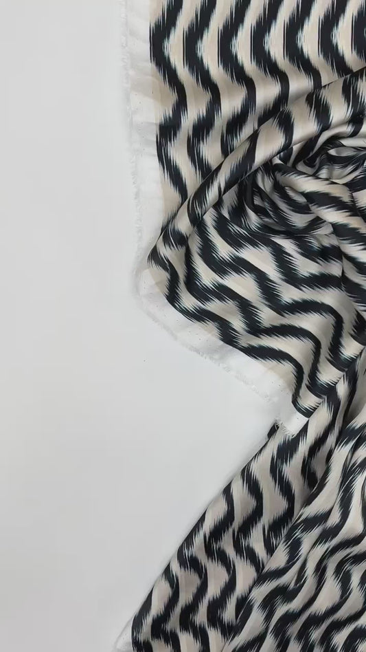 Italian satin fabric, beige and blue, with abstract pattern 85 g/m2