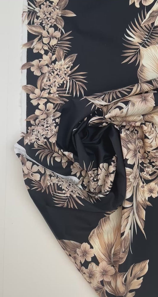 Tissu en coton italien à motif floral tropical sur fond noir – 120 g/m²