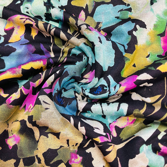 Image of Punto di Roma knit fabric - flowers on a black background 240 g/m² – available at Šarlotes audumi