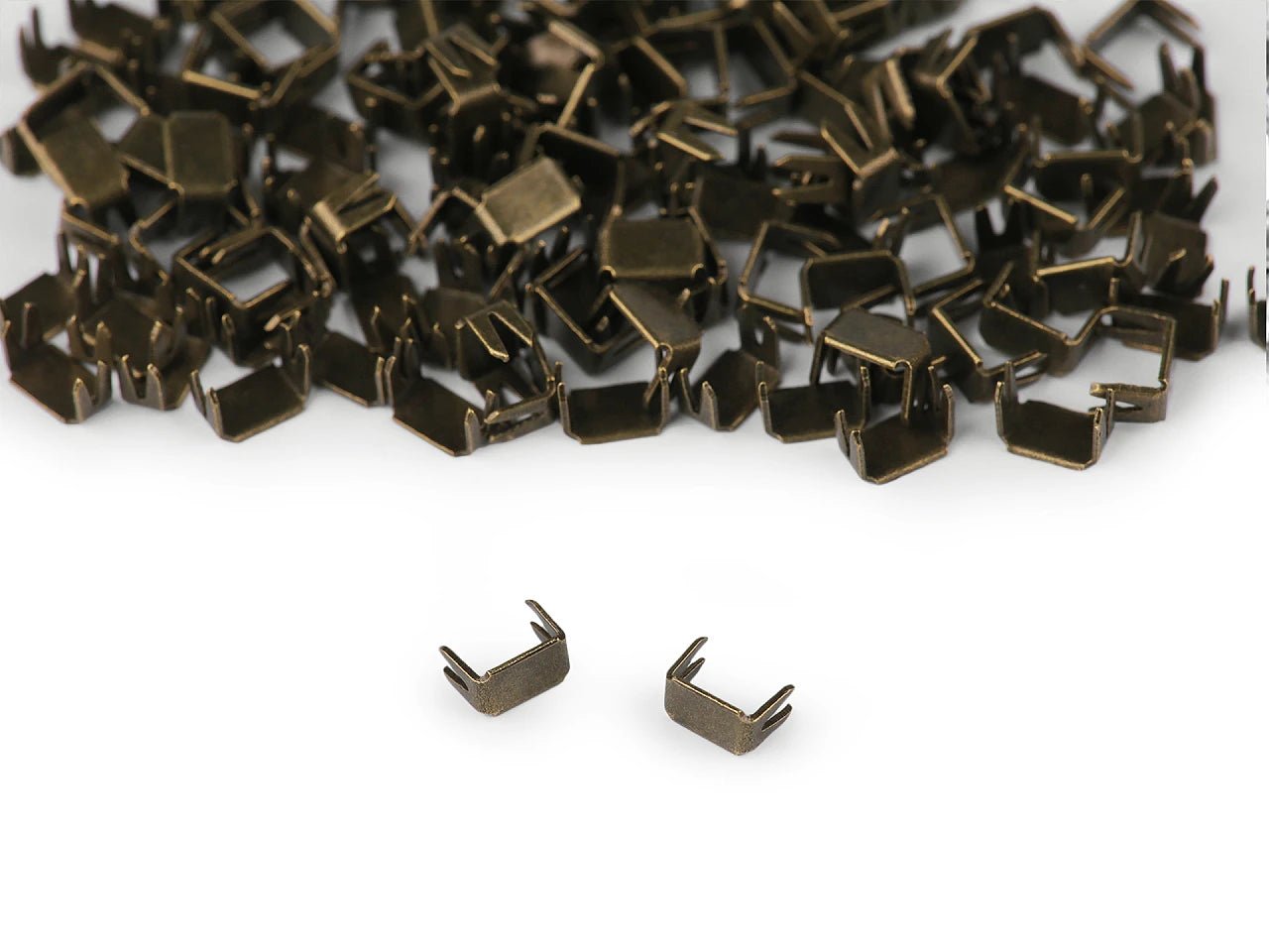 Image of zipper metal end stopper No. 3 – 3 × 5 mm, antique bronze – available online at Charlotte's Fabrics