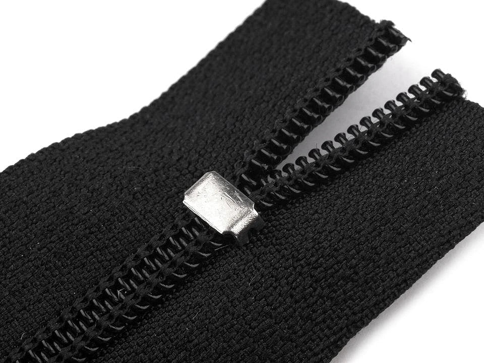 Image of metal zipper end stop No. 3 – 3 × 5 mm, antique bronze color – available online at Charlotte Fabrics