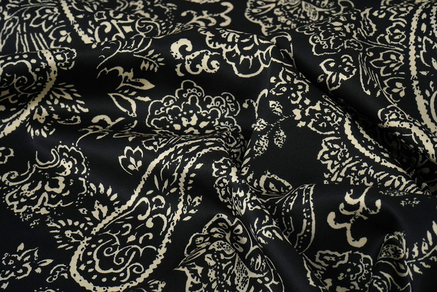 Satin with elastane - an elegant pattern on a black background 80 g/m²