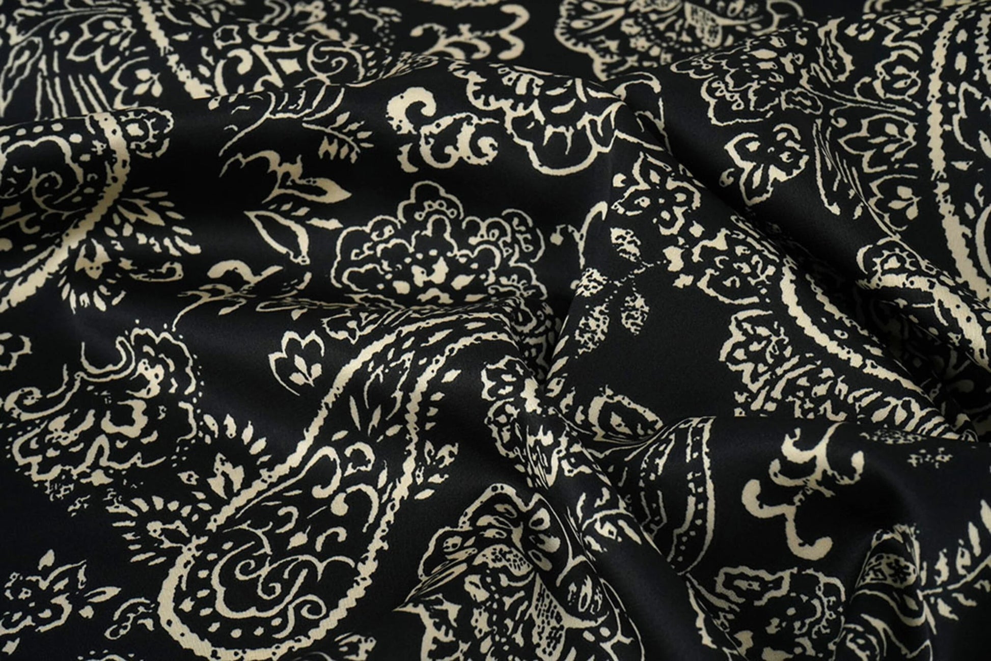 Satin with elastane - an elegant pattern on a black background 80 g/m²