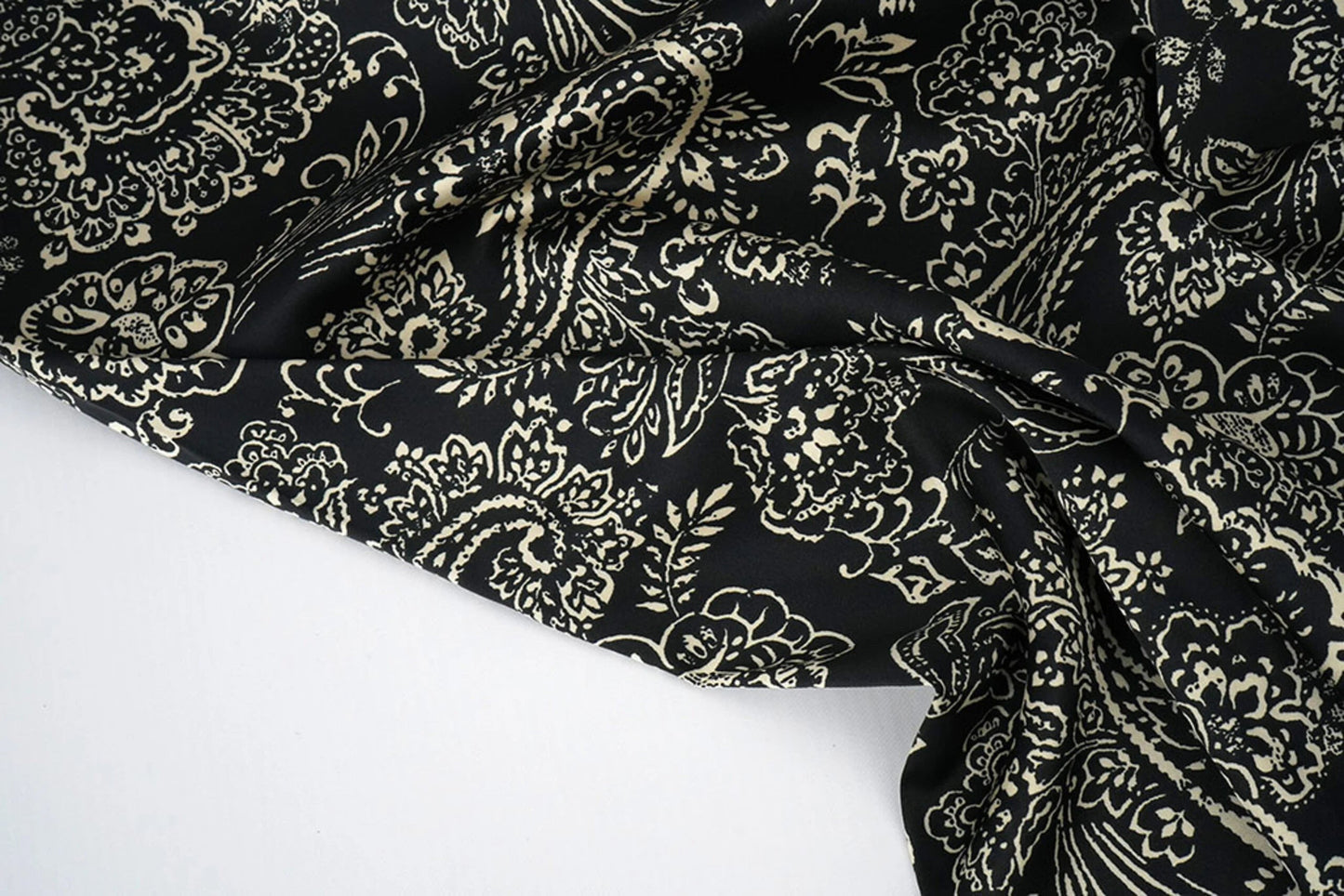 Satin with elastane - elegant pattern on a black background 80 g/m²