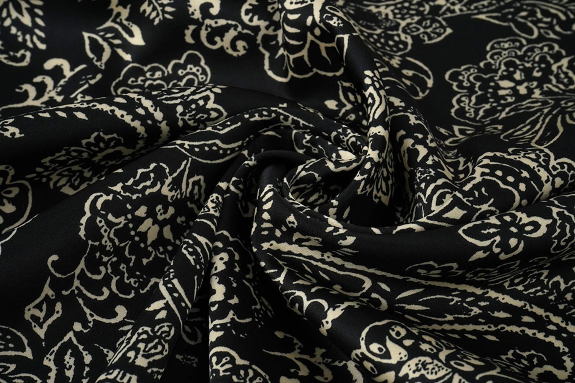 Satin with elastane - an elegant pattern on a black background 80 g/m²