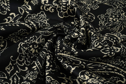 Satin with elastane - an elegant pattern on a black background 80 g/m²