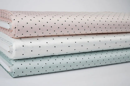 Satin with elastane - dots on a mint background 90 g/m²