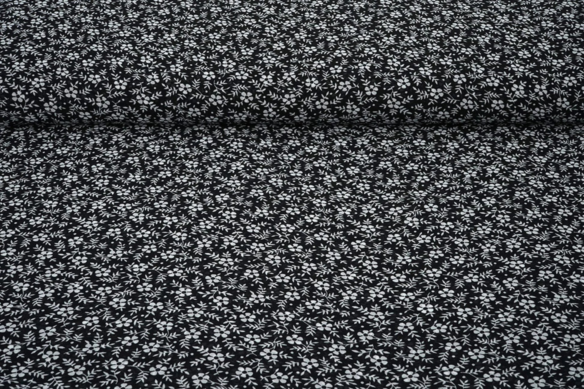 Chiffon à petites fleurs blanches sur fond noir | 150 cm | 65 g/m²