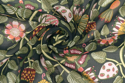 Image de chiffon à fleurs avec fils verts | 150 cm | 65 g/m² – disponible chez Charlotte Tissus