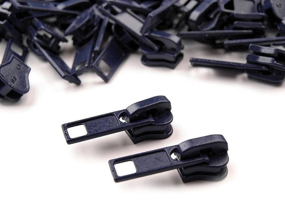Image avec curseur pour fermeture éclair en plastique n°5|teintes variées – disponible chez Charlotte Tissus